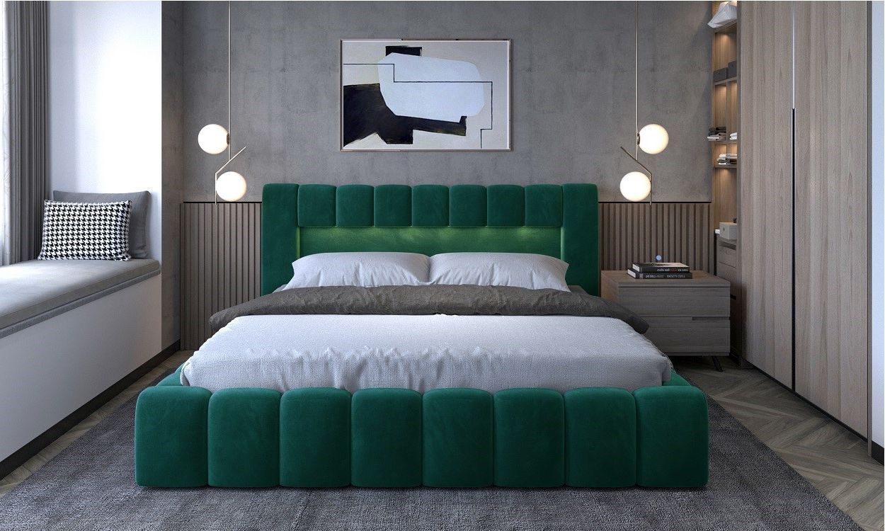 мягкая кровать в зеленом цвете