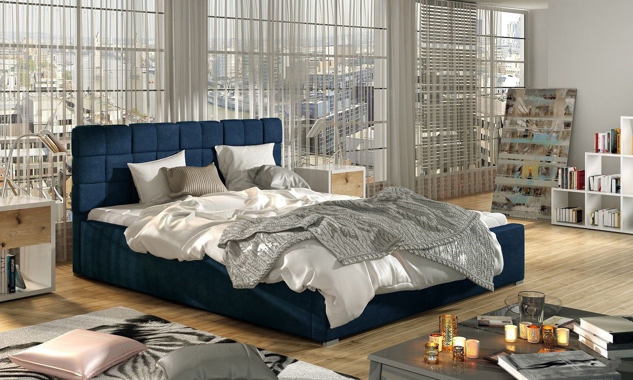 Мягкая кровать в синем цвете
