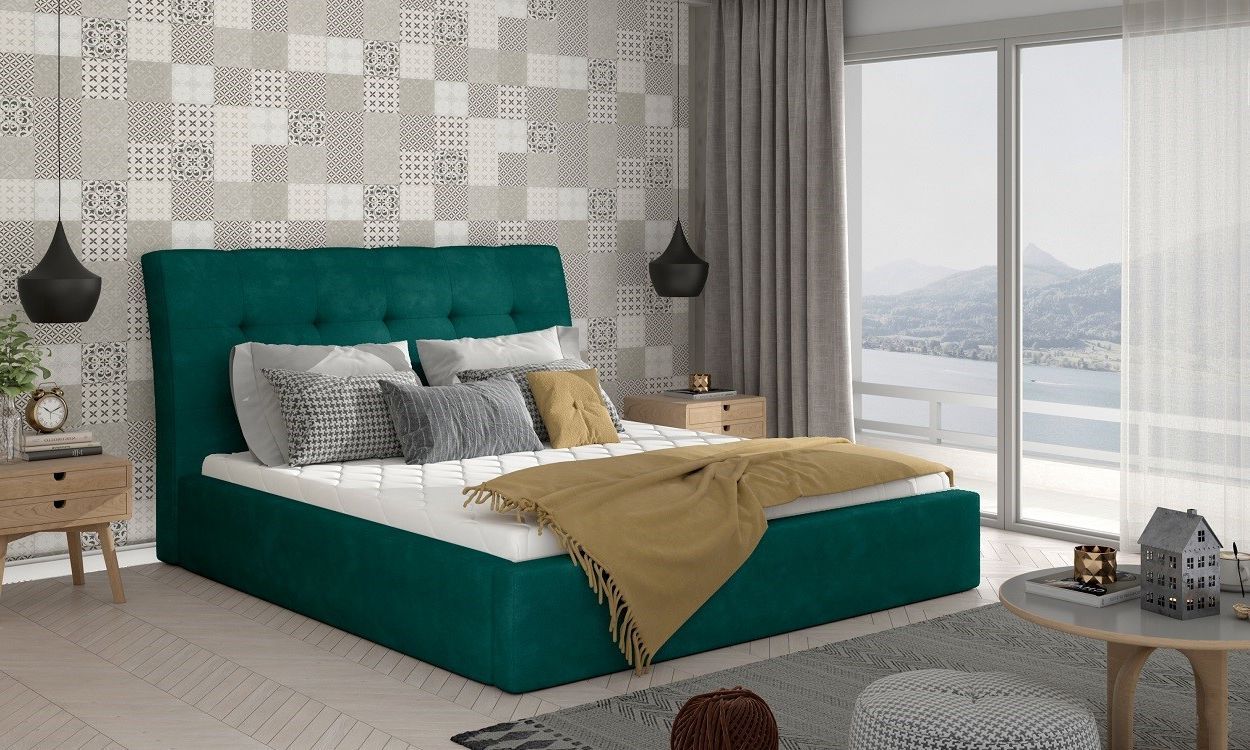 Мягкая кровать в зеленом цвета